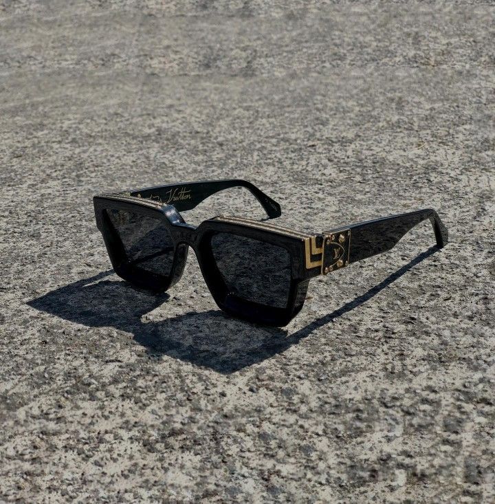 Lunette de soleil Louis Vuitton gold black